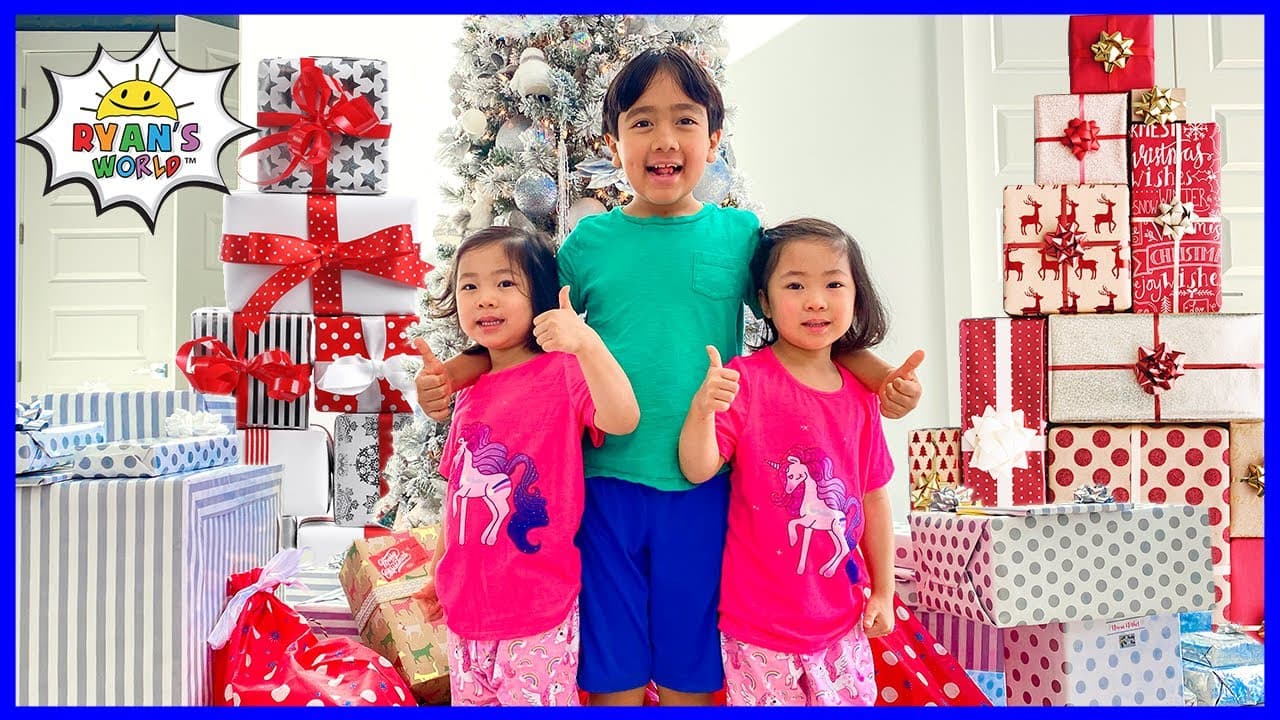 Ryan's Christmas Morning Opening Presents with Emma and Kate!!